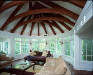 Example of timber frame architecture in a home by Millan Architects